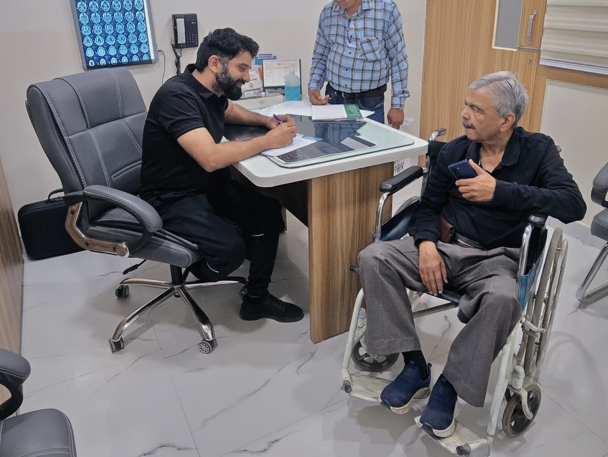 Dr Bhushan Kathuria during a patient consultation