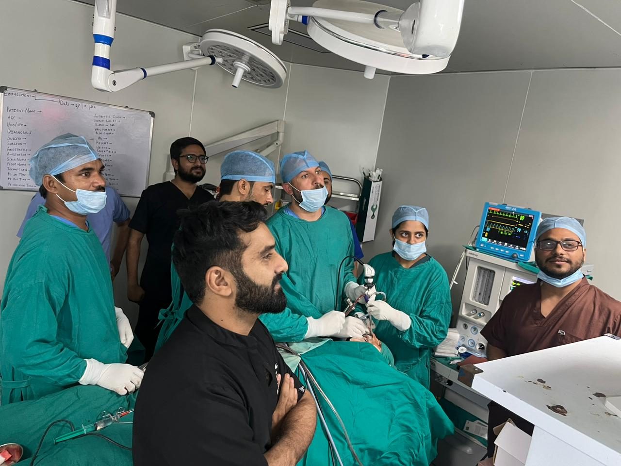 Dr Bhushan Kathuria leading the surgical team during an endoscopic procedure